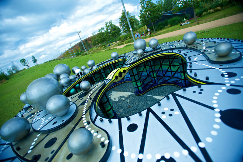 Queen Elizabeth Olympic Park. An open space in the complex of buildings and venues for the London 2012 Olympics. A play space with blue roof,